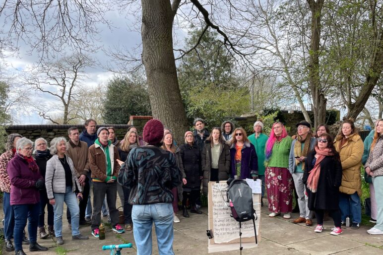 Orchard choir singing outside at a gig